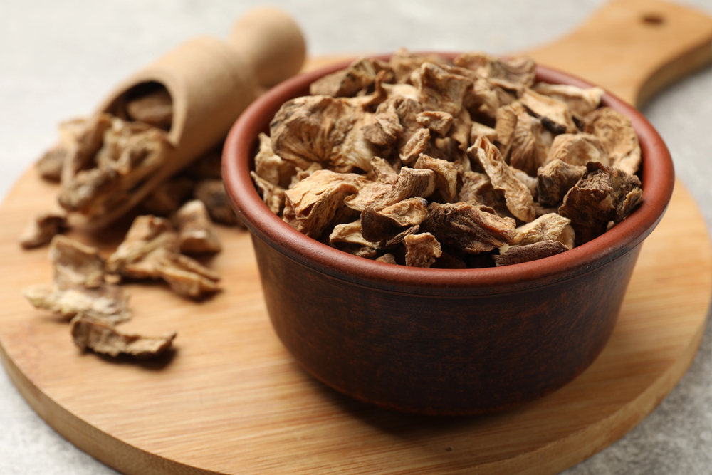 Close-up of roasted chicory root pieces ready for brewing
