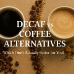 Decaf vs Coffee Alternatives: Which One’s Actually Better for You? Flat-lay of a cup of dark decaf coffee beside a creamy herbal coffee alternative, divided by coffee beans and herbs with the text ‘Decaf vs Coffee Alternatives: Which One’s Actually Better for You?’ on a warm brown background.