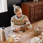A woman having herbal tea.